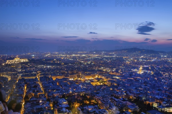 Amazing View on y Athens at magical blue hour (Acropolis of Athes at left corner) . View from Filothei hill