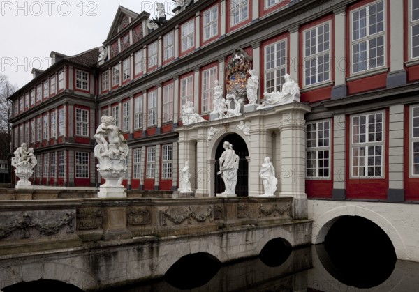 Wolfenbüttel Castle Portal façade partial view with moat and castle bridge present appearance 1714-17 by Hermann Korb Sculpture by Franz Finck