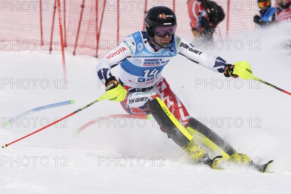 MOROZNAYA MOUNTAIN, KAMCHATKA PENINSULA, RUSSIAN FEDERATION, MARCH 28, 2019: Mountain skier Krystof Kryzl Czech skiing down mount slope. International Ski Federation Championship, slalom