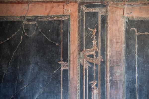 HERCULANEUM, ITALY, MAY 05, 2022, Old wall paintings in the ancient town of Herculaneum