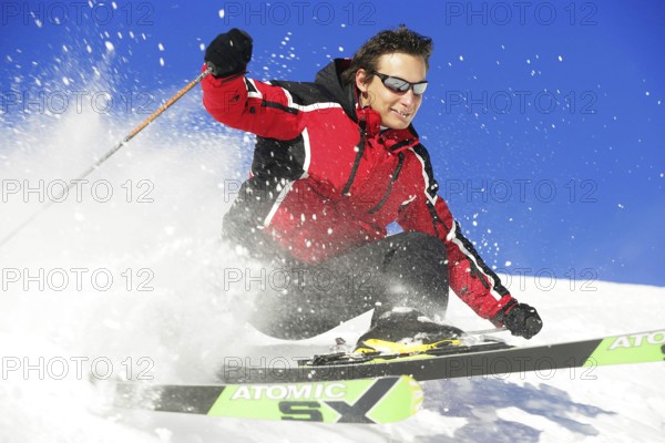Skier in action, rapid descent on a slope, 30-40years, Alps, Austria, Europe
