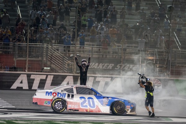 NASCAR Xfinty Driver, John Hunter Nemechek (20) celebrates his win for the Alsco Uniforms 250 at the Atlanta Motor Speedway in Hampton GA