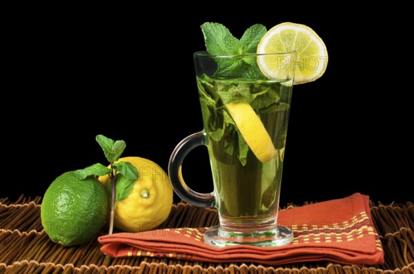 Cup of mint tea. Mint tea with lemon and fresh mint