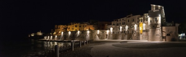Beautifully illuminated city wall at the coast of Vieste in Gargano, Italy, Europe