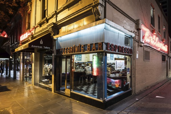 MELBOURNE, AUSTRALIA - OCTOBER 10, 2024: Melbourne's Pellegrini's Espresso Bar at night on October 10th, 2024