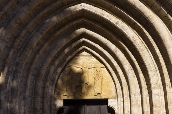 The Divi Blasii Church is a three-nave, cruciform hall church on the Untermarkt square in the town of Mühlhausen in Thuringia. The elaborately designed façade with tracery, pinnacles and a wheel window on the north side is located on an old trade route