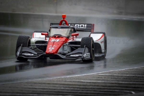 LUCA GHIOTTO (R) (51) of Arzignano, Italy comes through turn 12 (Canada Corner) during a wet practice session for the XPEL Grand Prix at Road America in Elkhart Lake, WI