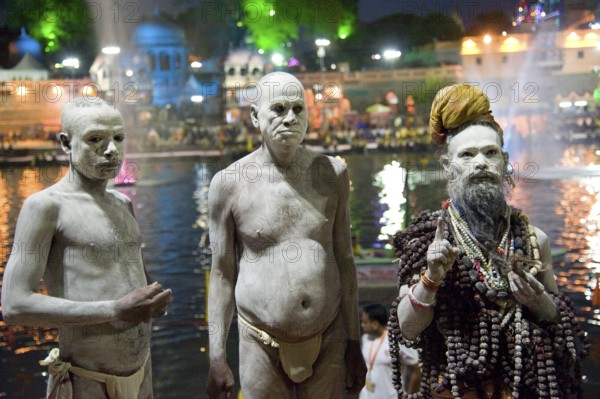 Naga sadhu standing near shipra river, madhya pradesh, india, asia