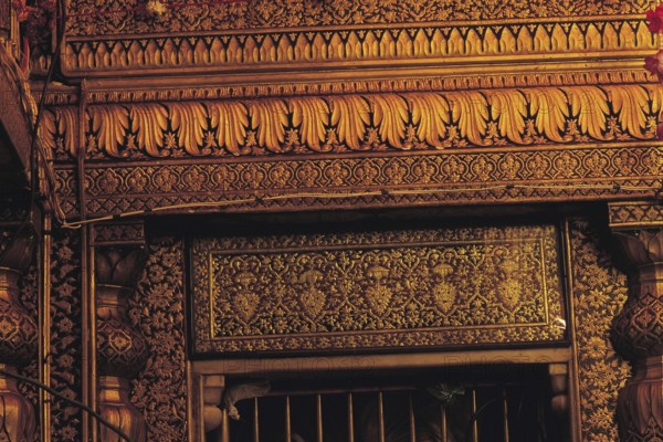 Gold plate embossed golden temple, amritsar, punjab, india, asia