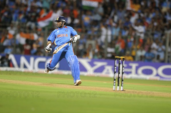 Batsman Sachin Tendulkar complete run 2011 ICC World Cup Final Sri Lanka Wankhede Stadium Mumbai