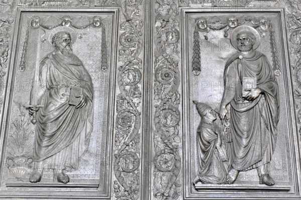 Detailed relief of figures of saints surrounded by biblical symbols, Rome, Lazio, Italy, Europe