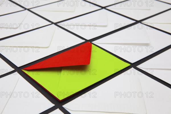 Composition with white and colored envelopes on the table. The photo suitable for various holidays and anniversaries