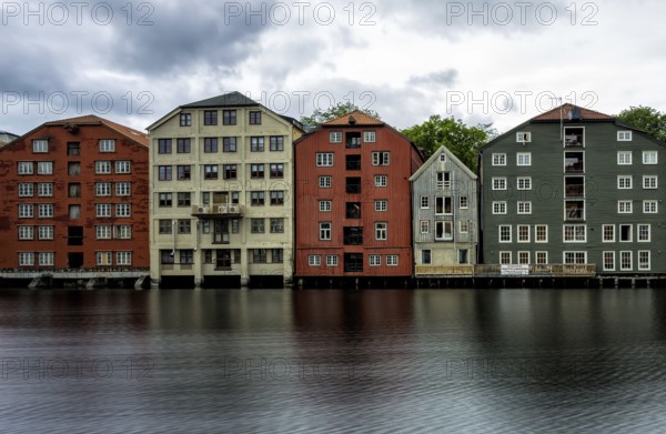 View of warehouses at the Nidelva river in Trondheim, Norway, Europe