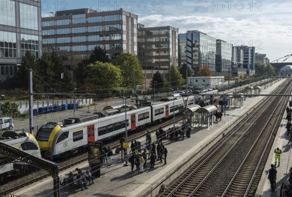 Etterbeek, Brussels Capital Region, Belgium, 10 15 2019 Students and commuters waiting at the regional trainwaystation of Etterbeek, Europe