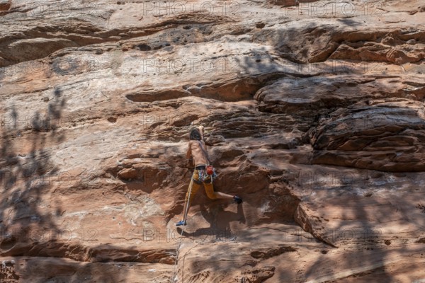 Climber on the Geierstein rock, Geierstein, Palatinate Forest, Bruchweiler-Bärenbach, Rhineland-Palatinate, Germany, Europe