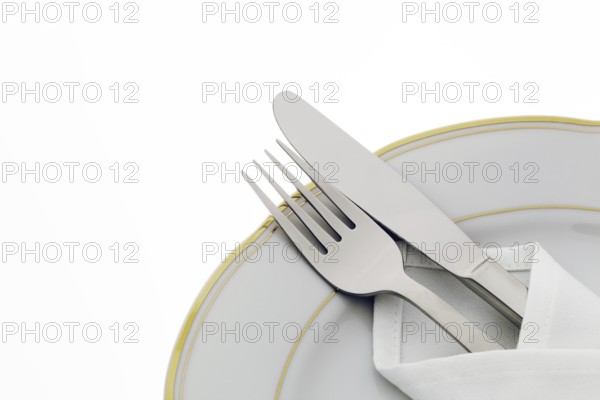 A knife with fork and plate. Place setting for a dinner in a restaurant. Austria