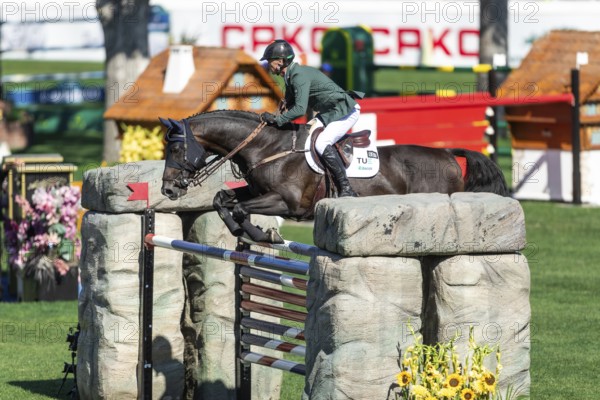 Denis Lynch of Ireland, riding Vistogrand compete in the BMO Nations Cup during the CSIO Spruce Meadows, Masters, in Calgary, Alberta, Canada, North America