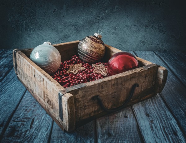 Christmas decorations in an old wooden box