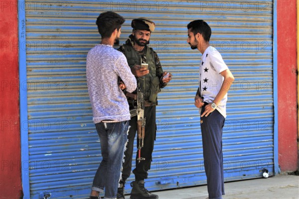 Army man during death anniversary of Hizbul Mujahideen, Kashmir, India, Asia