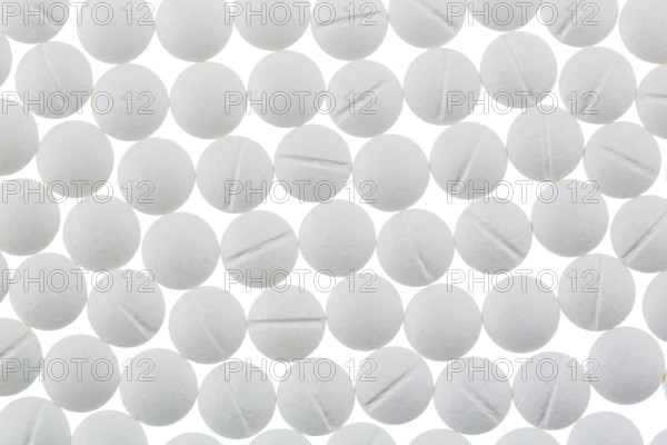 White tablets, symbolic photo for medicine, remedies and tablet addiction