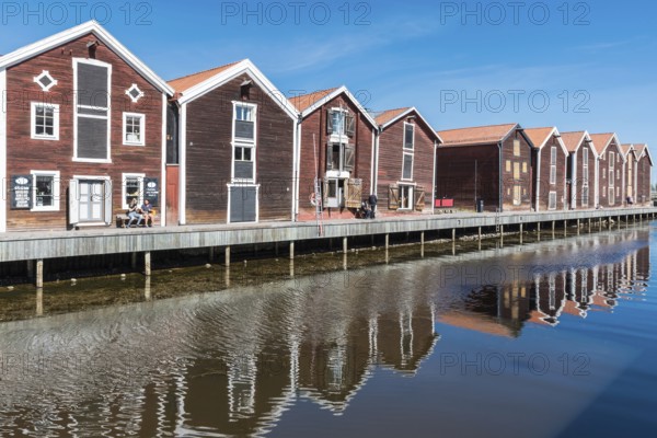 Hudiksvall, Halsingland, Gavleborg County -Sweden, 08 01 2019 Reflecting fishing warehouses in the city center