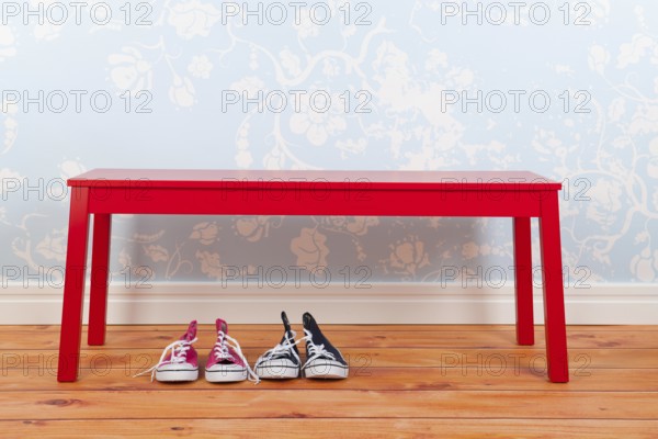 Hall with blue vintage wall paper red bench on and wooden floor and shoes