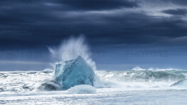 Diamond Beach, iceberg in the surf, near Jökulsarlon glacier lagoon, Vatnajökull National Park, Hornafjörður, South Iceland, Iceland, Europe