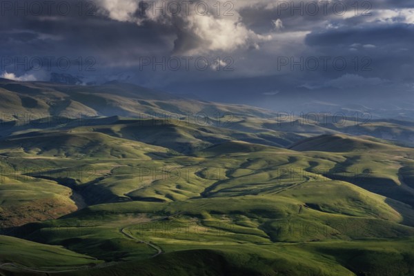 Beautiful landscape with hills in Caucasus mountains at sunset, Russia, Europe