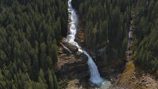 Aerial view of Krimml Waterfalls on sunny day. High Tauern National Park, Austrian Alps, Austria, Europe
