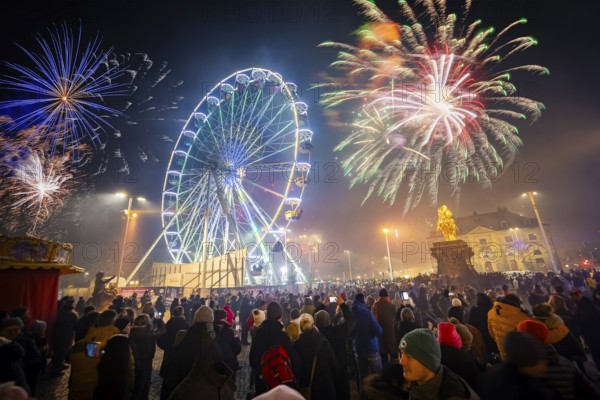 New Year's Eve at the Augustusmarkt in Dresden, on the Neustädter Markt at the Golden Horseman. Dresden, Saxony, Germany, Europe