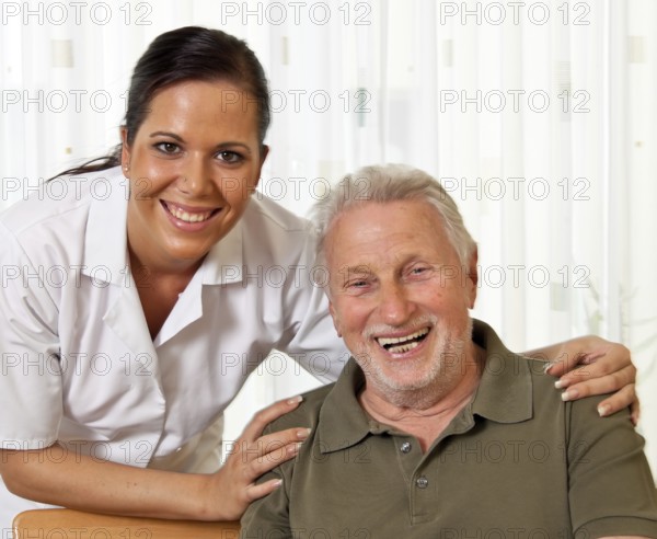 A carer caring for the elderly in a retirement home in Austria
