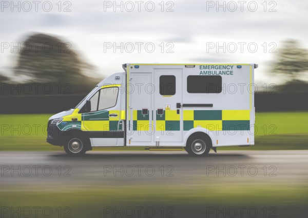 A United Kingdom Ambulance Rushing To An Emergency In The Countryside