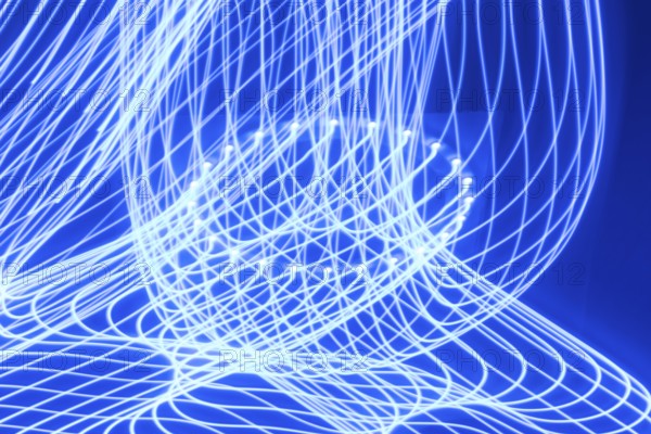 Abstract light strips with blue light - motion blur due to long exposure