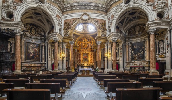 TURIN, ITALY - CIRCA MAY 2021: Antique baroque interior with vintage decoration. Royal Church of San Lorenzo (St. Lawrence)