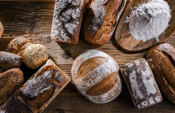 Composition with assorted bakery products on wooden table