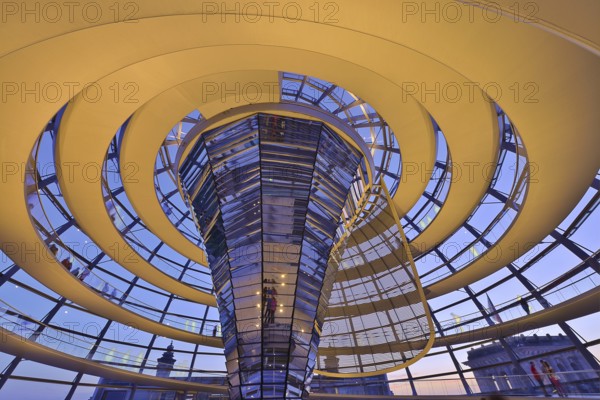 Reichstag building in Berlin. The large glass dome at the very top of the Reichstag has a 360-degree view of the surrounding Berlin cityscape. The main hall of the parliament below can also be seen from inside the dome, and natural light from above radiates down to the parliament floor. The Reichstag building is a historical edifice in Berlin, Germany, constructed to house the Imperial Diet of the German Empire, Europe
