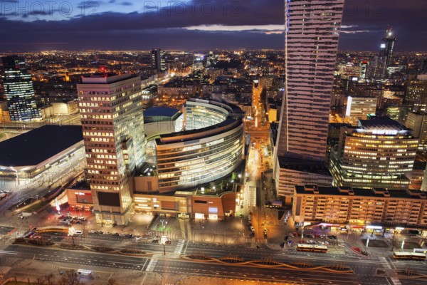 Cityscape of Warsaw by night, capital of Poland, downtown city centre