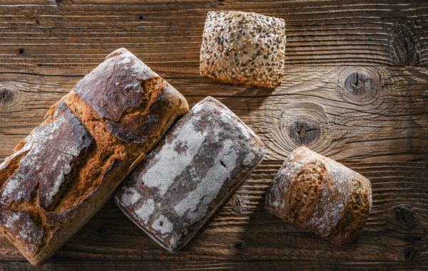 Composition with assorted bakery products on wooden table