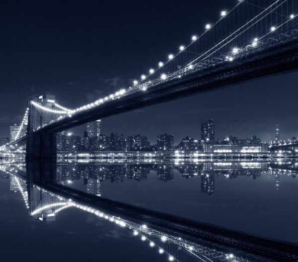 New York City, Brooklyn Bridge with reflections on water
