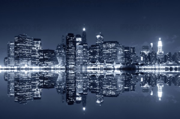 Manhattan at night, New York City. View from Brooklyn