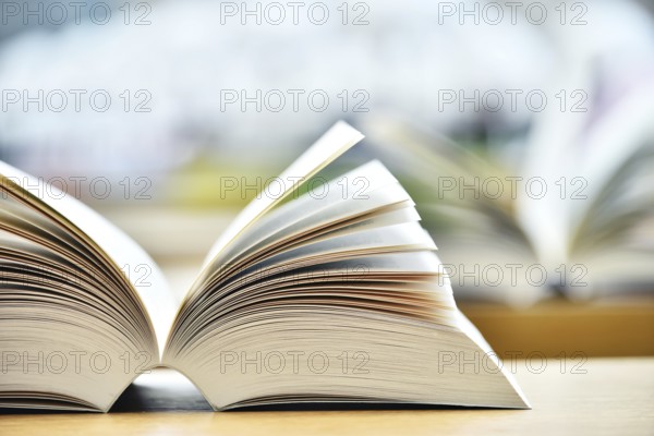 Books lying on the table in the public library