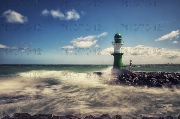 Warnemünde harbour entrance in the surf