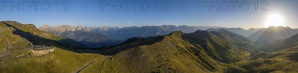 Morning atmosphere, aerial view, panorama at Colle Basset with Assietta ridge road, Sauze d'Oulx, Sestriere, Piedmont, Italy, Europe