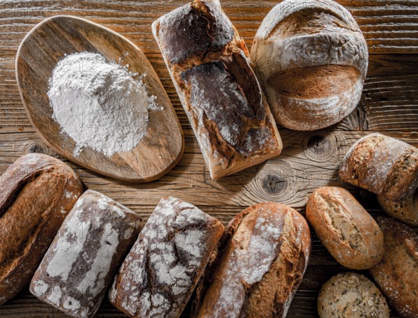 Composition with assorted bakery products on wooden table
