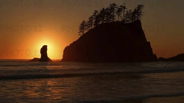 Rocks and pinnacles in front of sunset at Second Beach, Second Beach, Washington, USA, North America