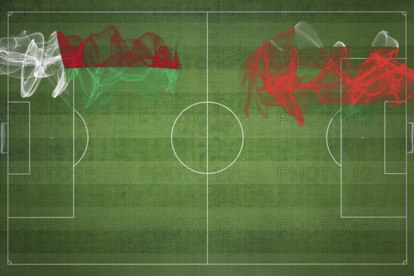 Madagascar vs Oman Soccer Match, national colors, national flags, soccer field, football game, Competition concept, Copy space