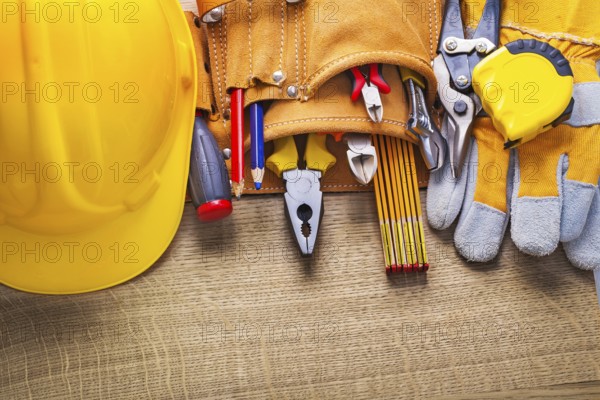 Set of construction tools in toolbelt