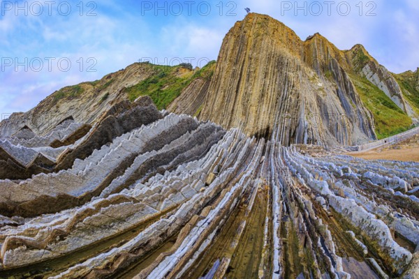The most unusual beach in the Basque Country - Itsurun. Flysch - unique landscape of underwater rocks exposed at low tide. Magical landscape