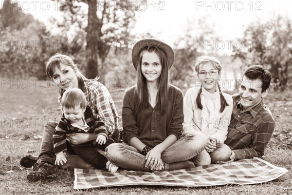 Happy frendly family have a picnic outdoor