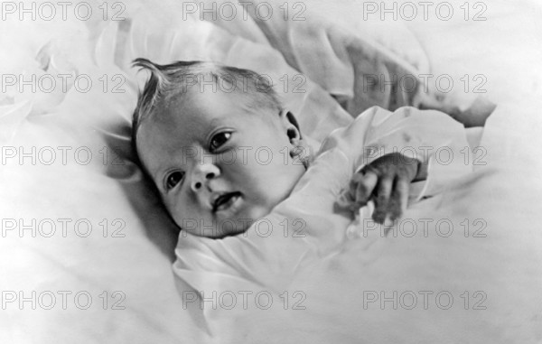 Queen Margrethe II of Denmark. In the picture she is four weeks old and the picture was taken in connection with her baptism on May 14, 1940